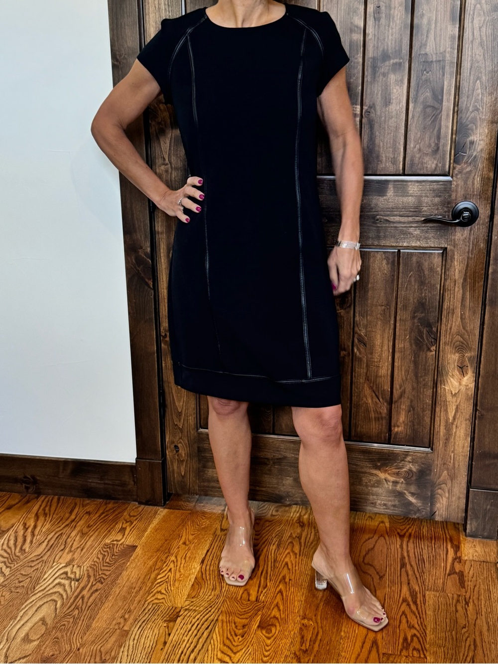 Elegant Black Short-Sleeve Mini Dress with leather seams